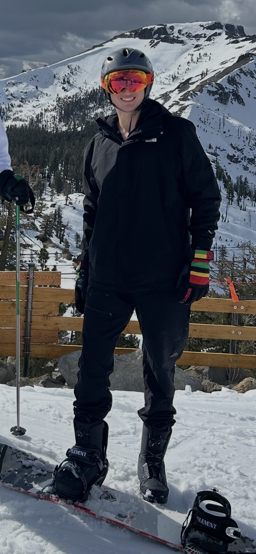 Dylan Brown snowboarding in the mountains.